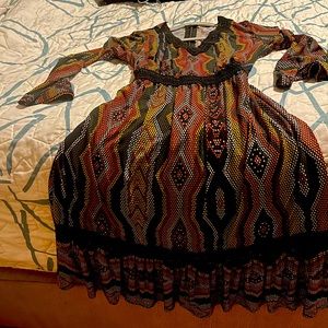 Autumn dress, small. Fits more like medium. Wore twice, new condition!